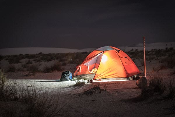 Beach camping tent at night